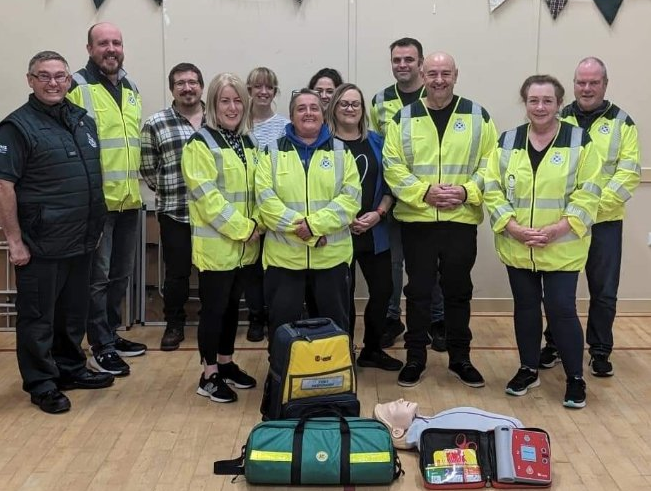 Uist First Responders with some of their kit in front of them