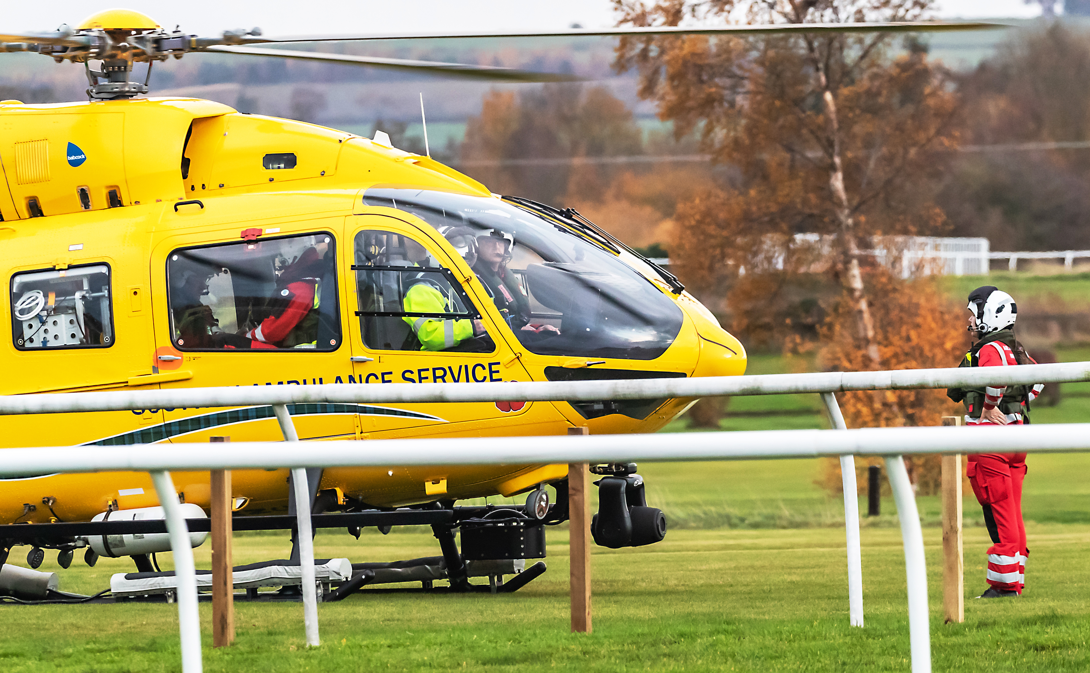 An Air Ambulance helicopter at a race course