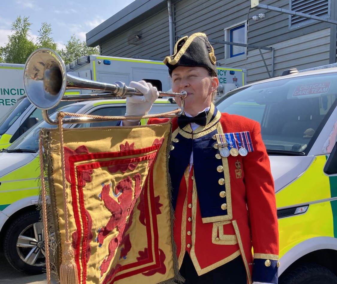 Gerry  playing trumpet at ambulance station