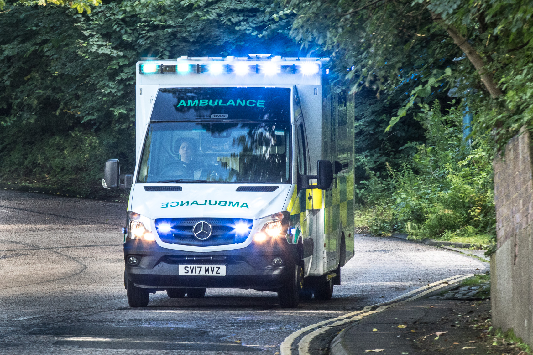 An A&E ambulance going to an emergency