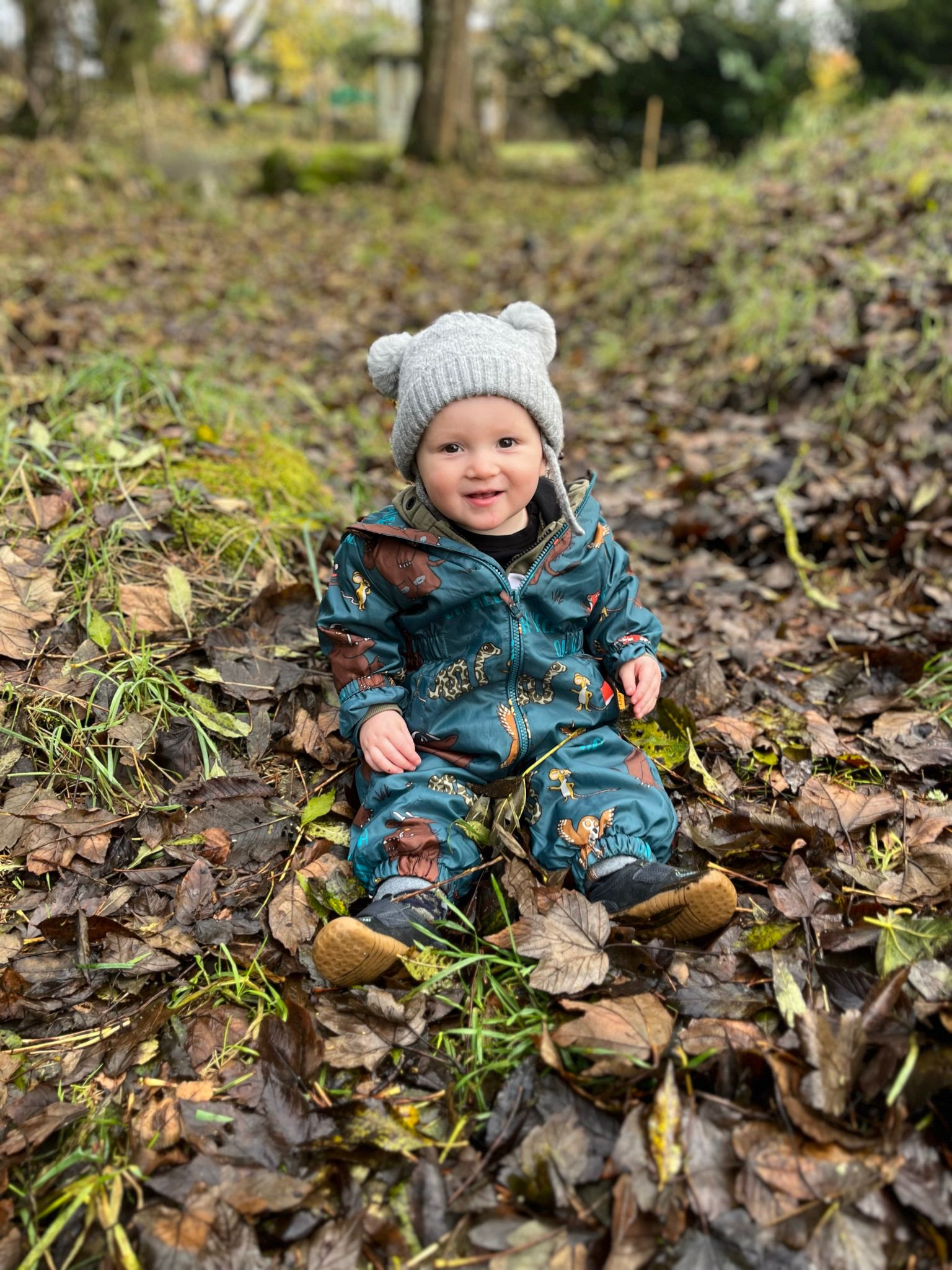 Picture of Jackson Taylor sitting in leaves