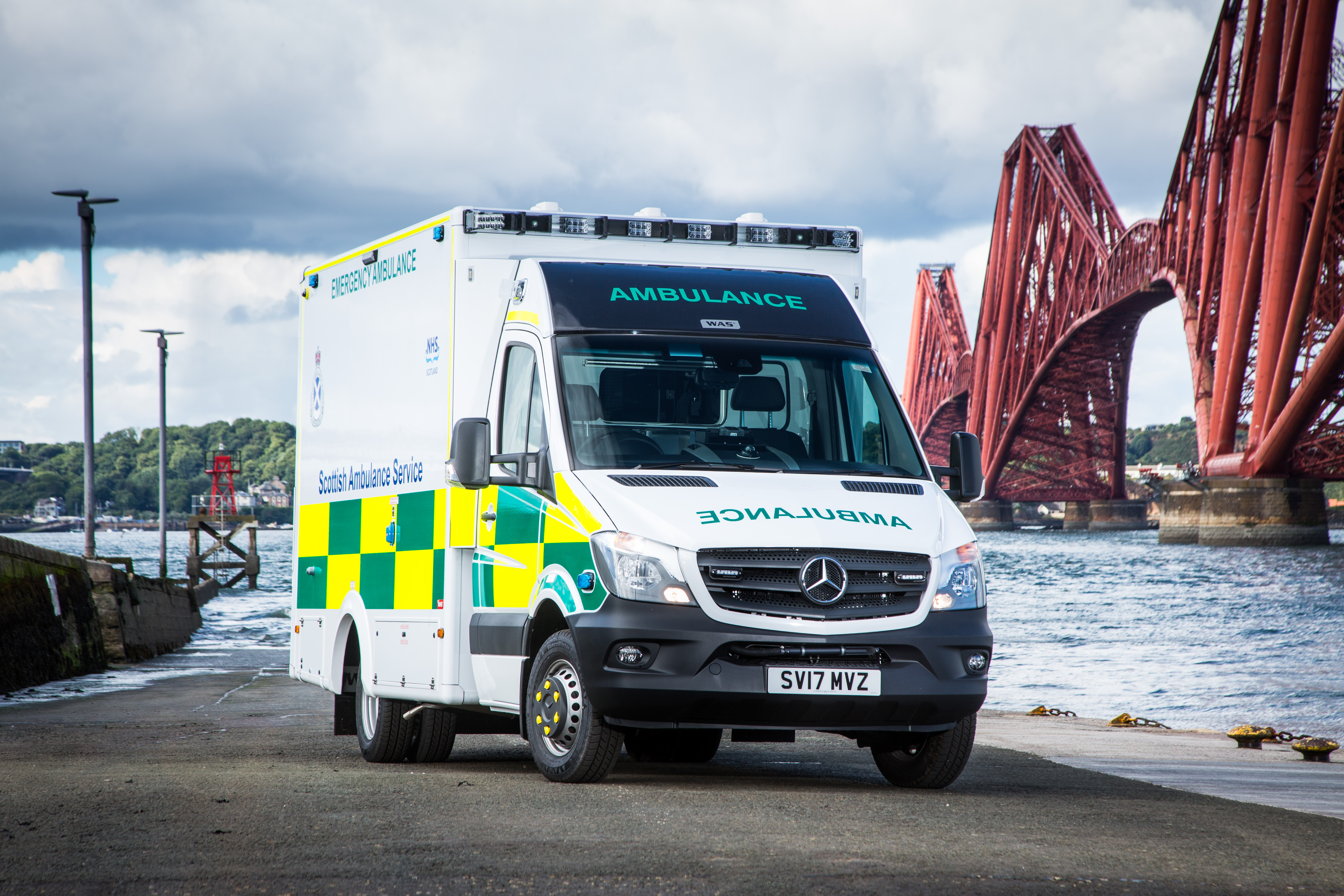 An ambulance next to the Forth Bridge