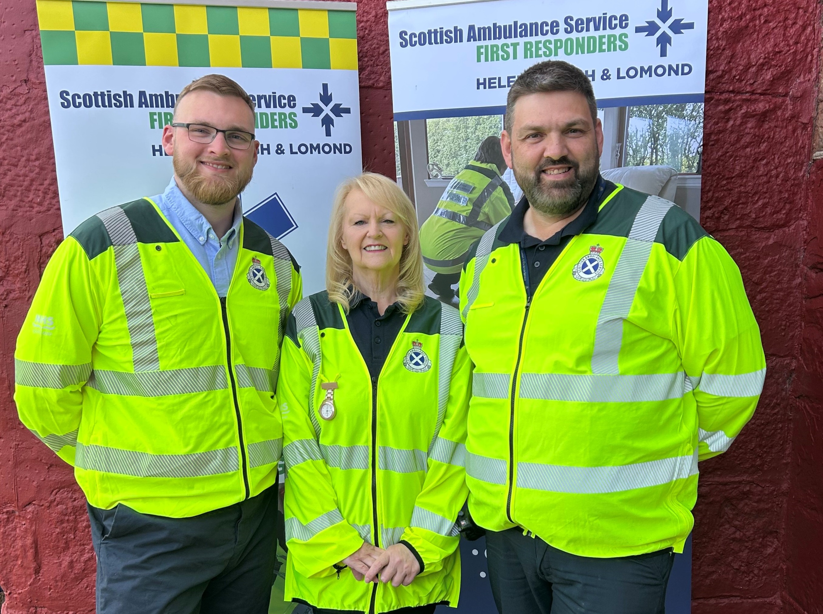 A group of three community first responders in uniform