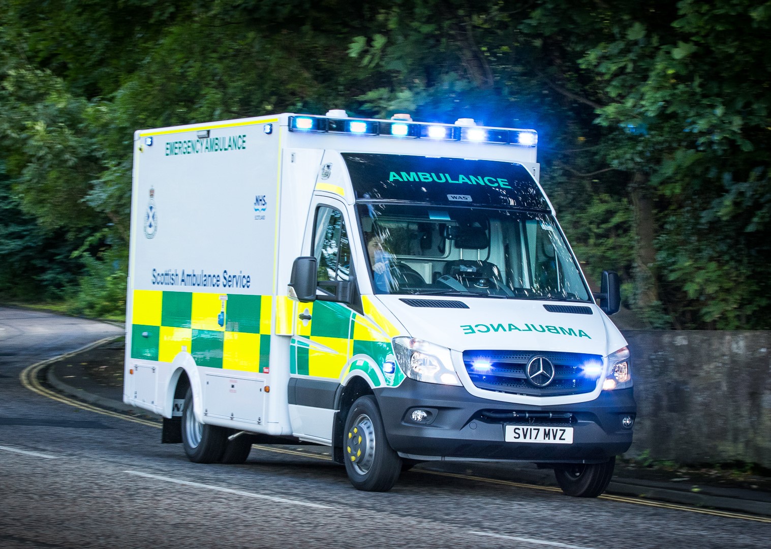 An A&E ambulance going to an emergency
