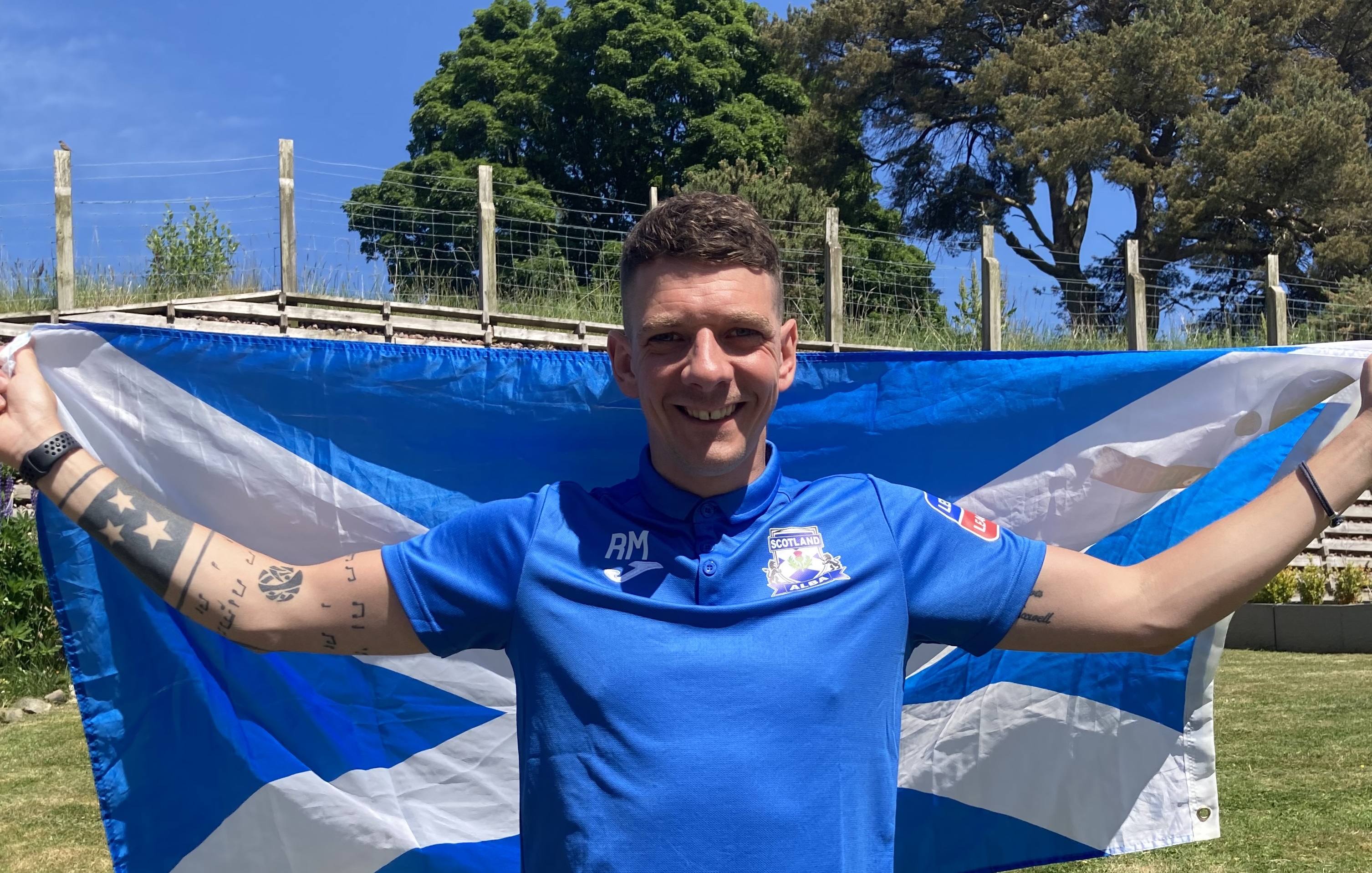 Ritchie in Scotland match outfit and flag