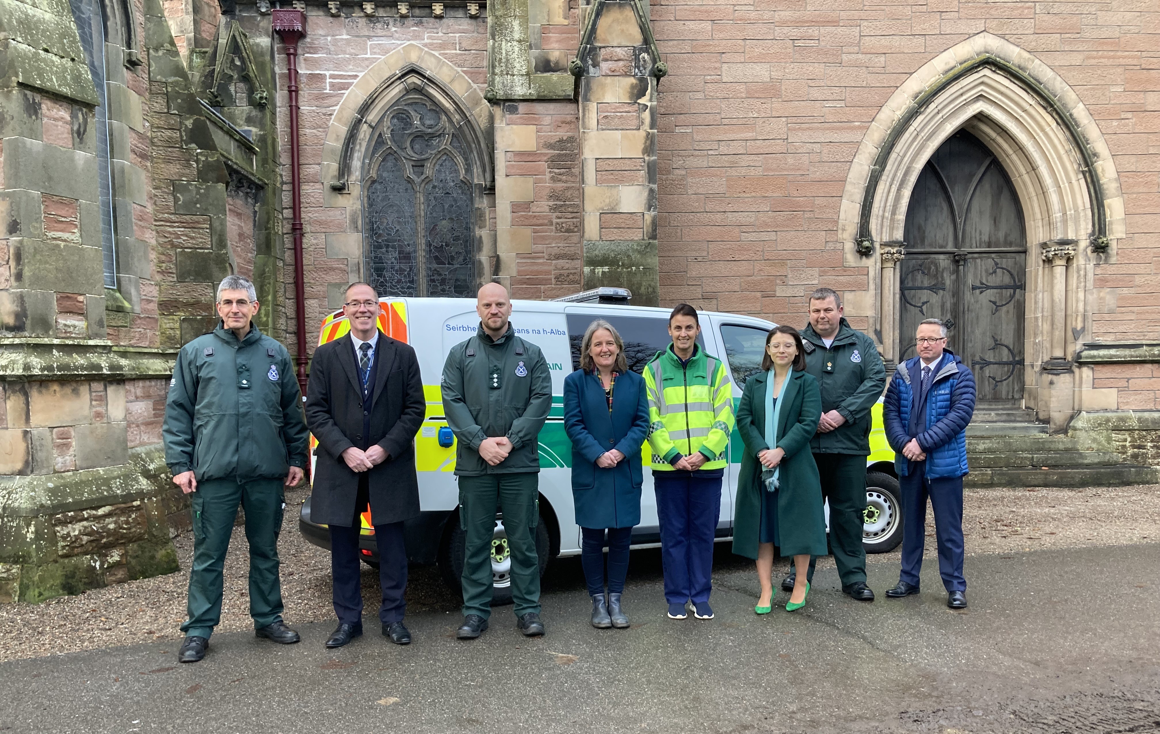 Photo of SAS staff members in front of a mental health vehicle