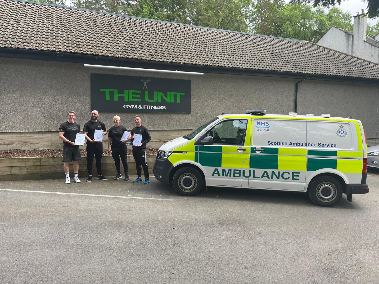 Gym staff with their certificates
