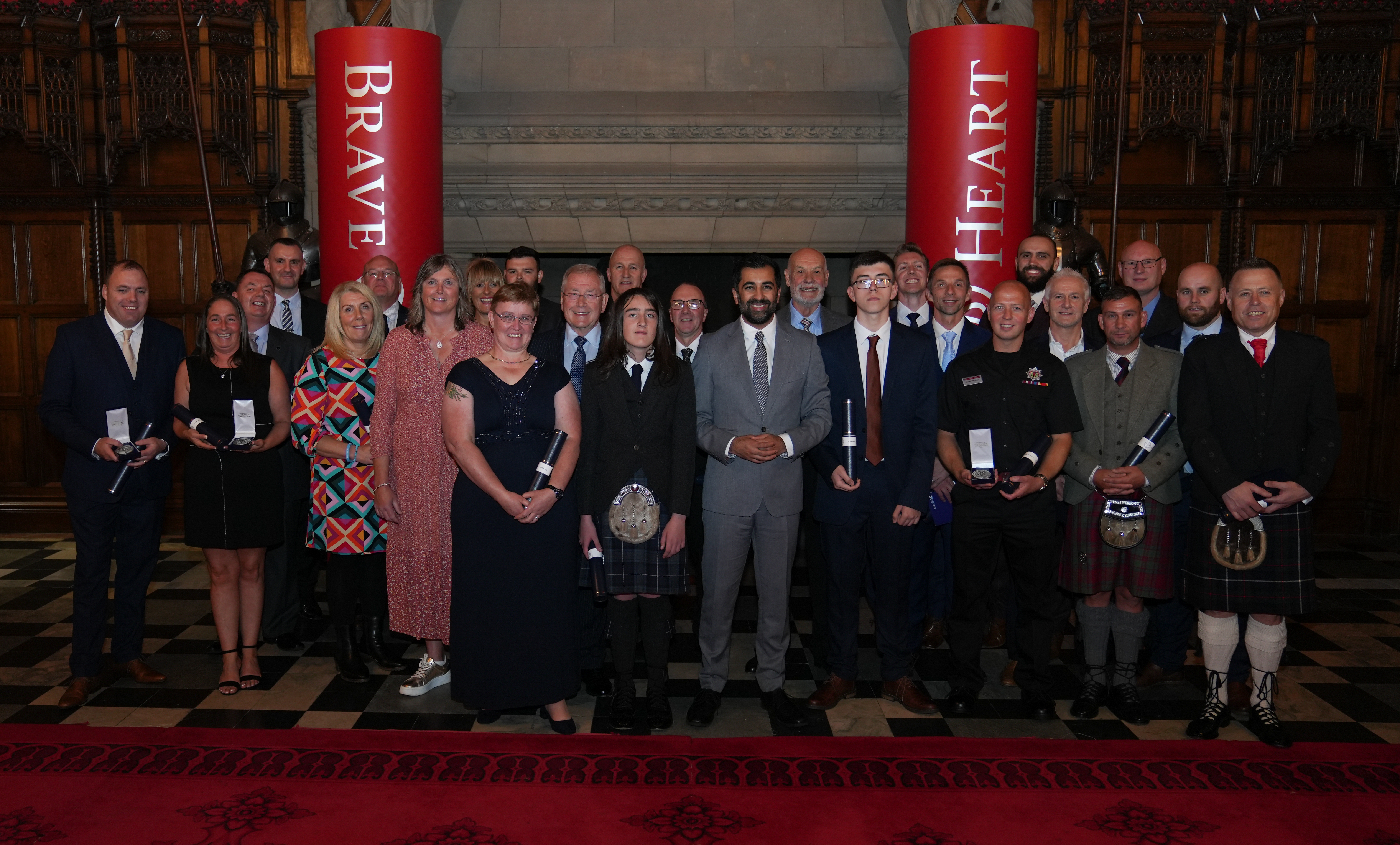 Group photo of attendees at the Brave@Heart awards including Hamza Yousef