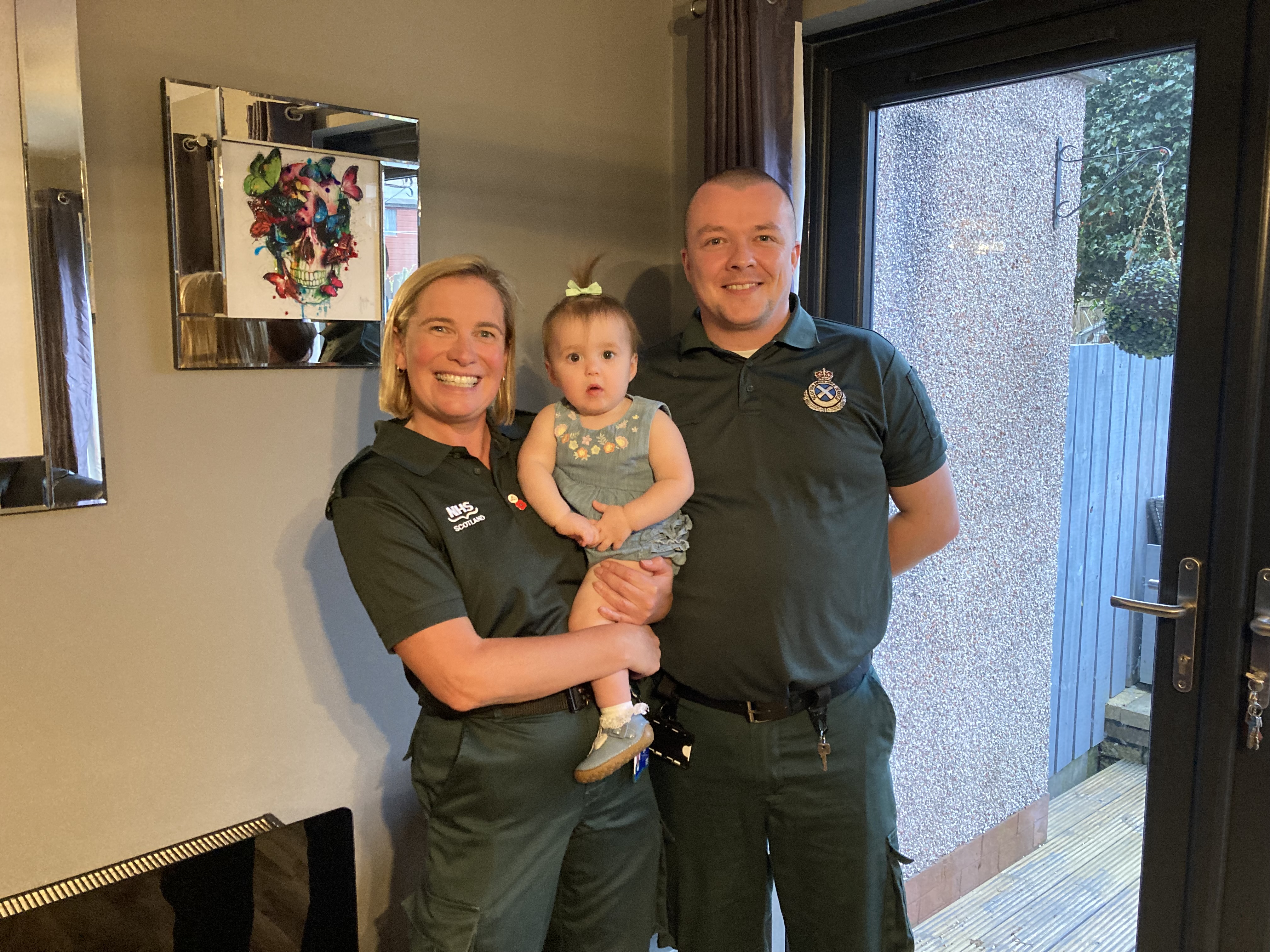 Scott and Kerry holding Penney