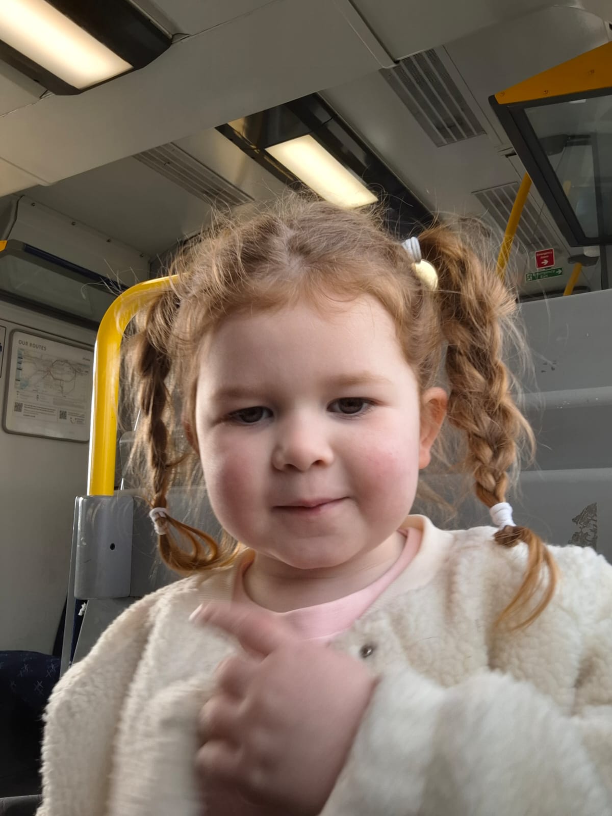Picture of Amelia inside an ambulance, no expression