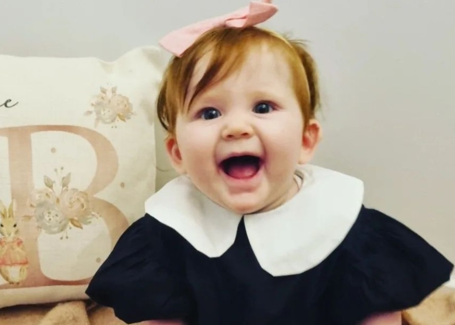 Billie smiling at the camera