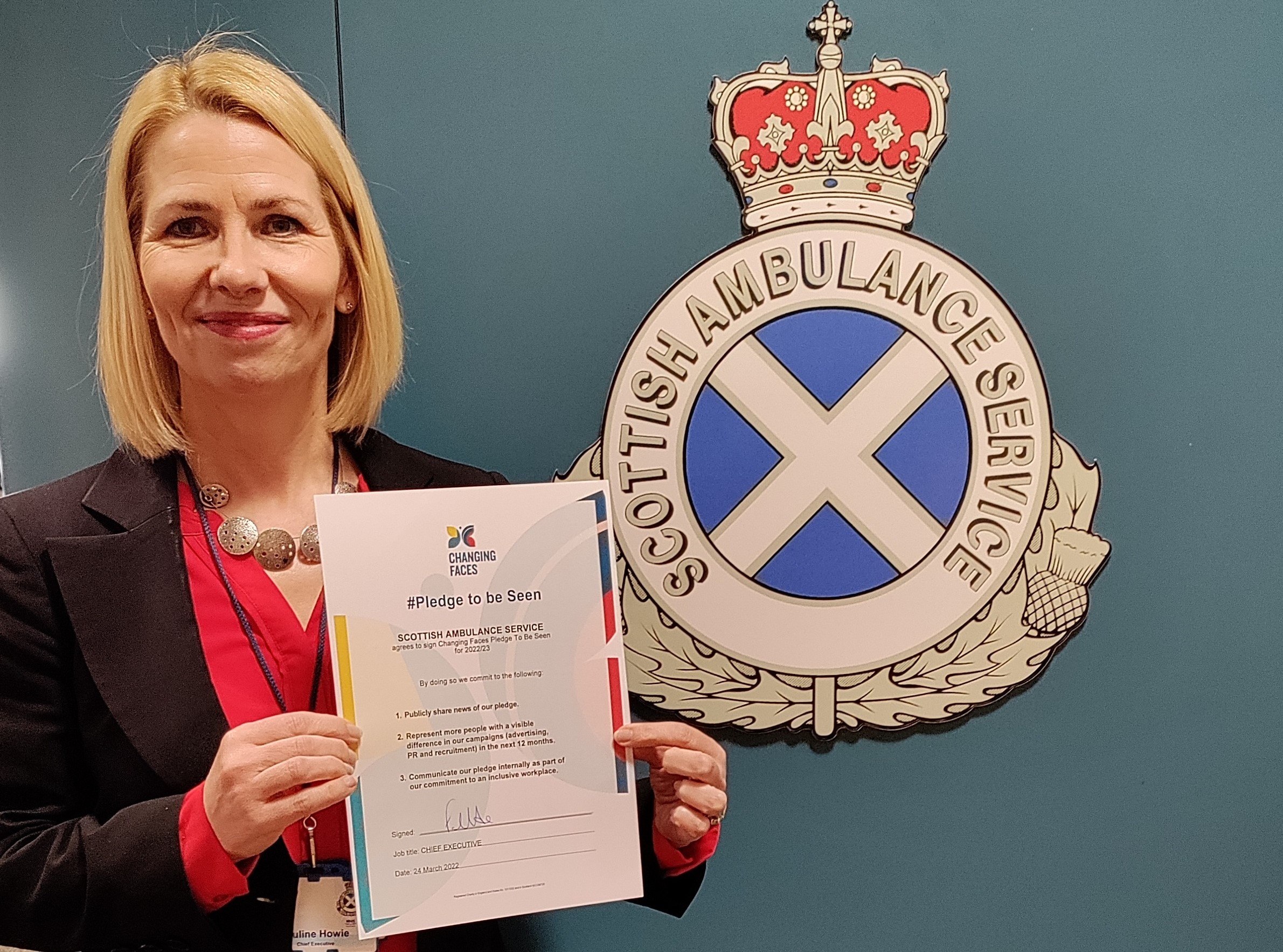 Pauline Howie with the pledge for Changing Faces